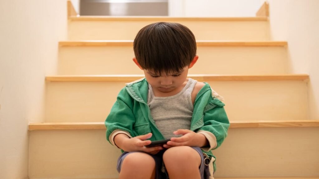 child angry about stopping screen time handphone meltdown at home