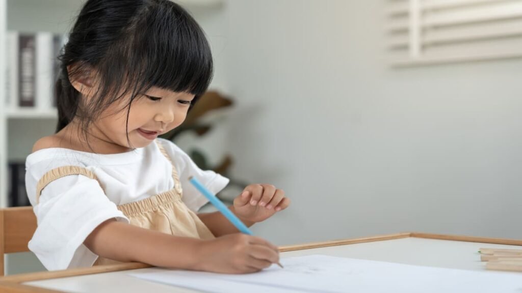 kid drawing and doodling at home screen free activity for kids