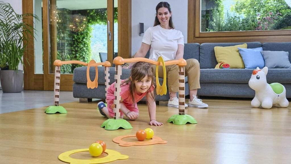 A young girl crawling and moving around while playing a floor game