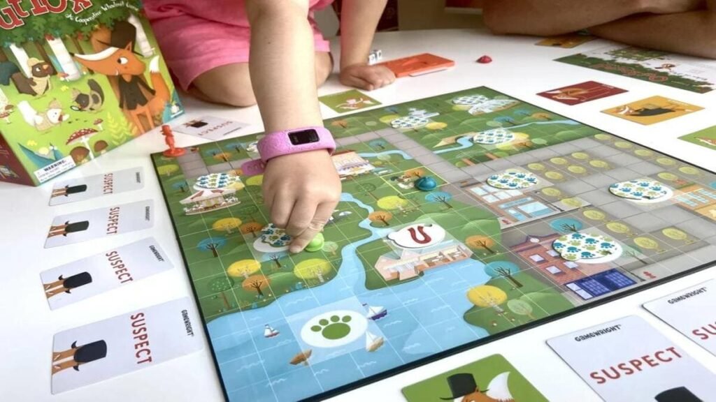 A child's hand moving a meeple game piece on the Outfoxed! board game