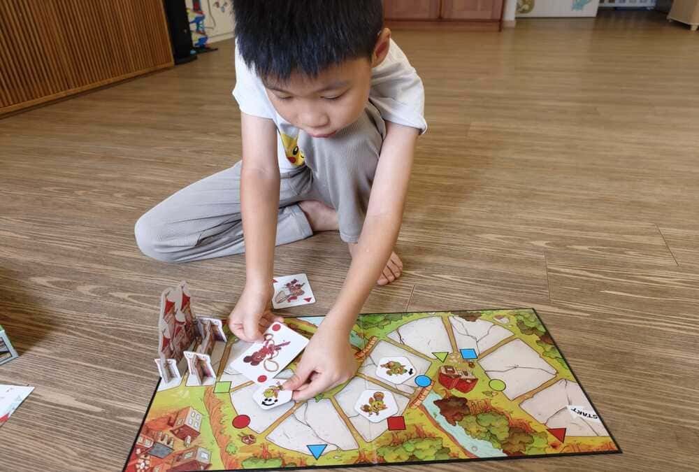 Children exploring a fantasy adventure in My First Castle Panic board game