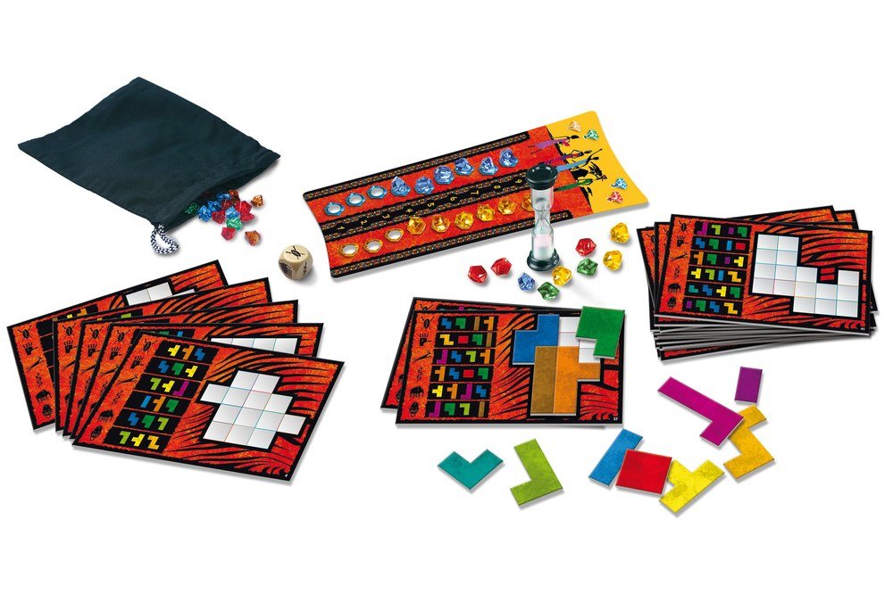 Ubongo puzzle boards with colourful shape tiles, gems, a timer and a drawstring bag.